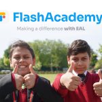 Two pupils with thumbs up smiling