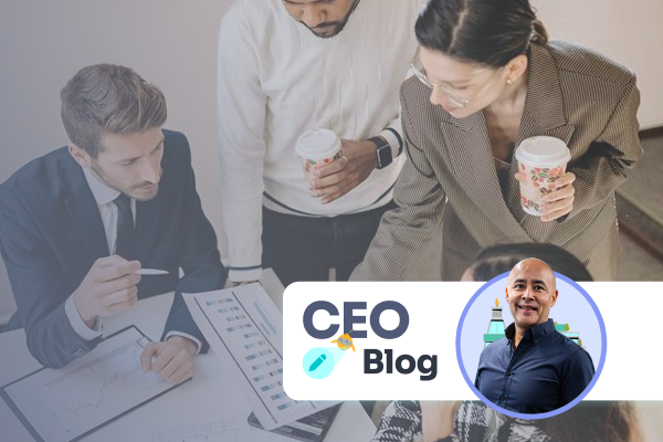 Image of three professionals in strategy planning meeting. Overlaid is a picture of Veejay Lingiah, with the words CEO Blog in a white box.
