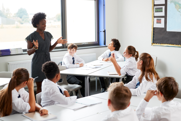 teacher and learners in classroom